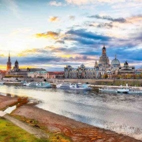Amazing Sunset in Dresden on Elbe river with Cathedral of the Holy Trinity and Bruehl's Terrace.