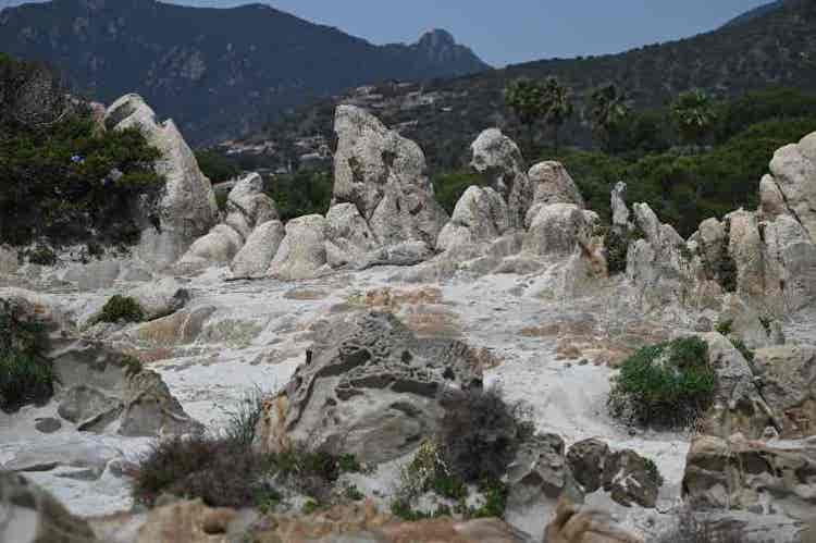 scenic-view-of-rocks-scattered-over-a-rocky-terrai