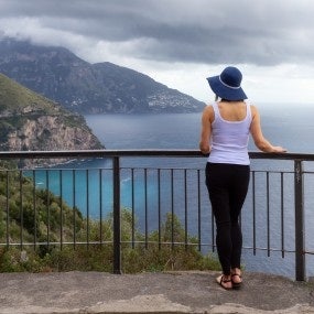 woman-tourist-looking-at-mountain-landscape